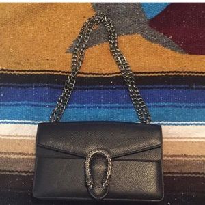 Black leather dionysus bag.
